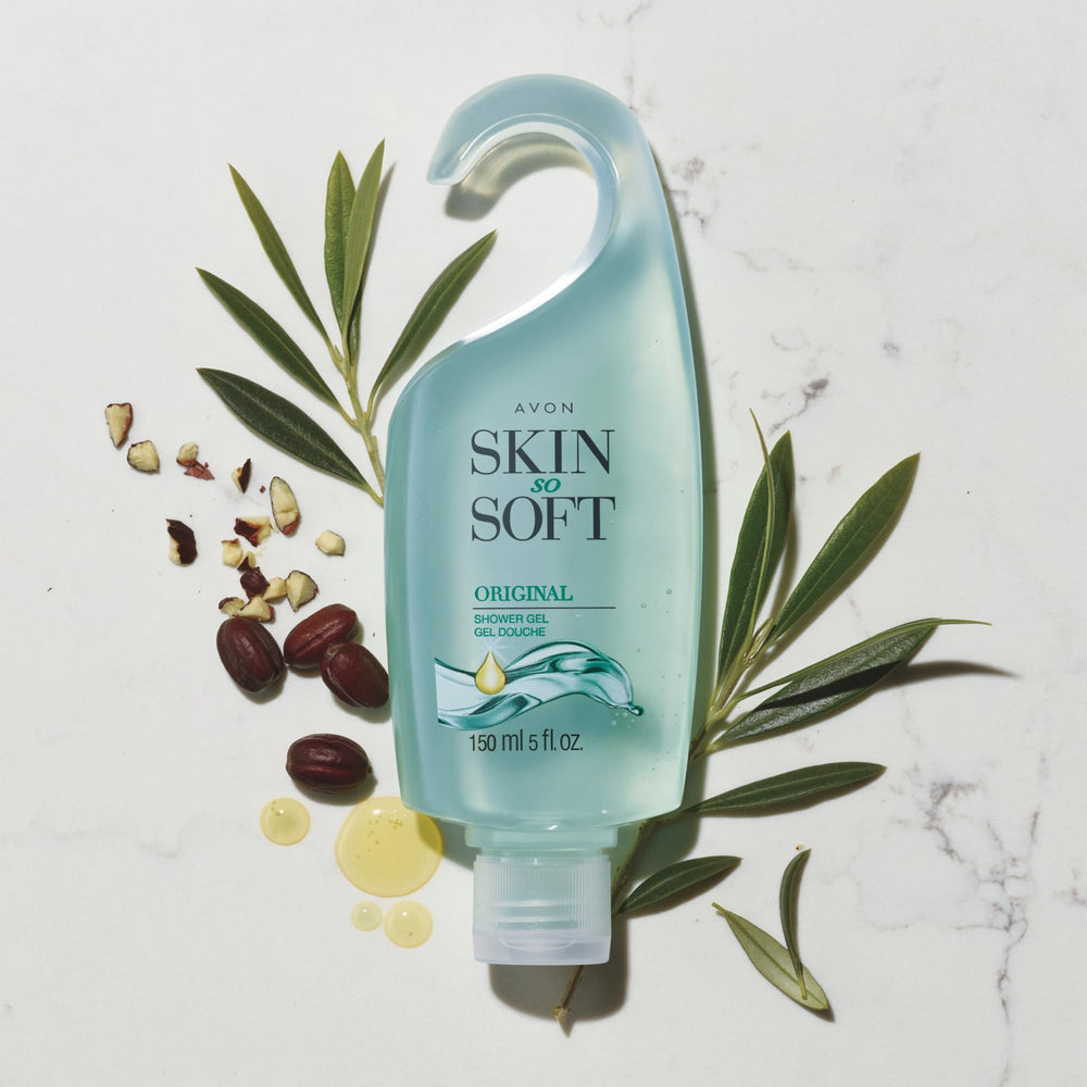 Hands applying AVON Skin So Soft gel in the shower for cleansing.