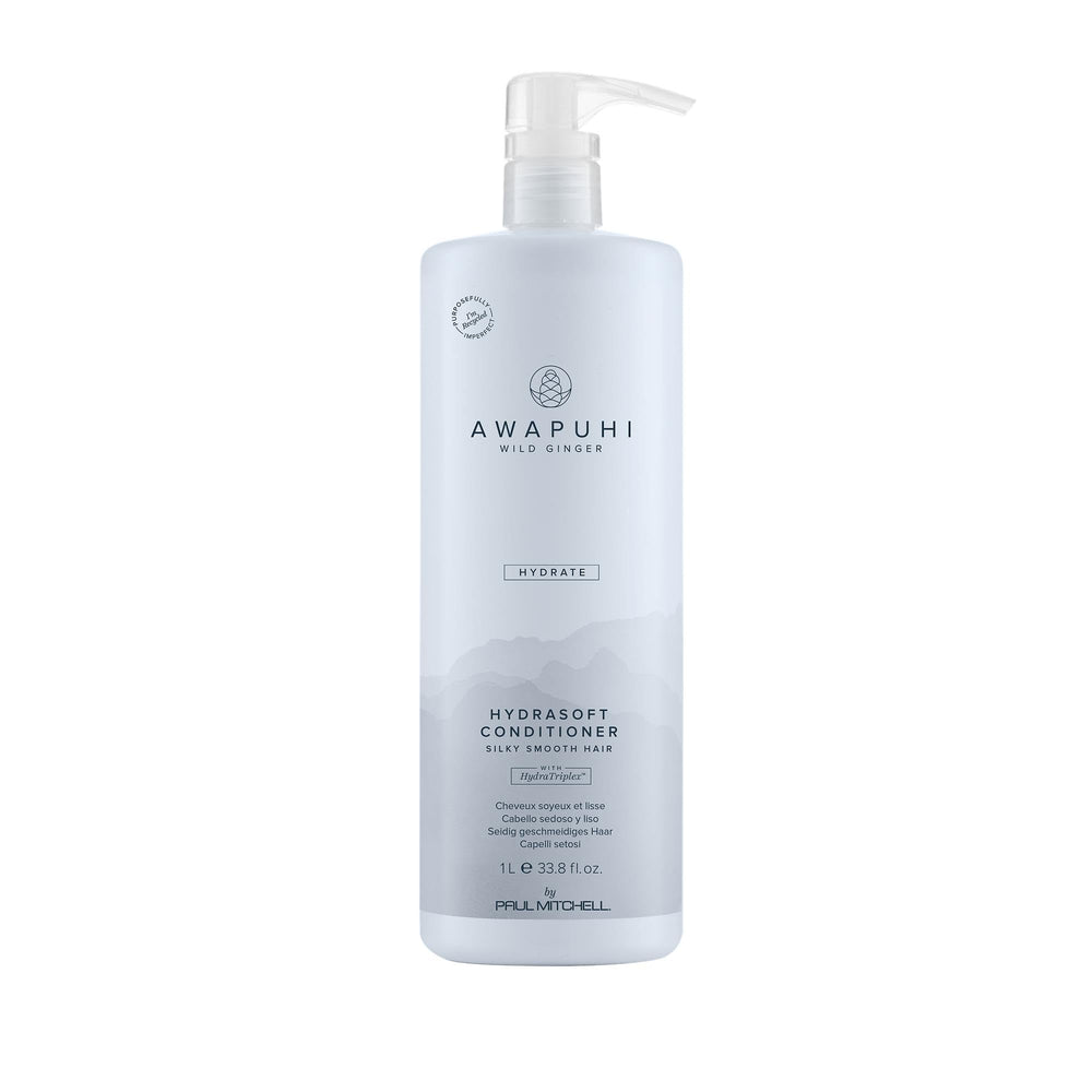 Awapuhi Wild Ginger HydraSoft conditioner bottle on counter for silky hydration.