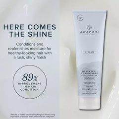 Awapuhi Wild Ginger HydraSoft conditioner label close-up shows color-safe, paraben-free formula.