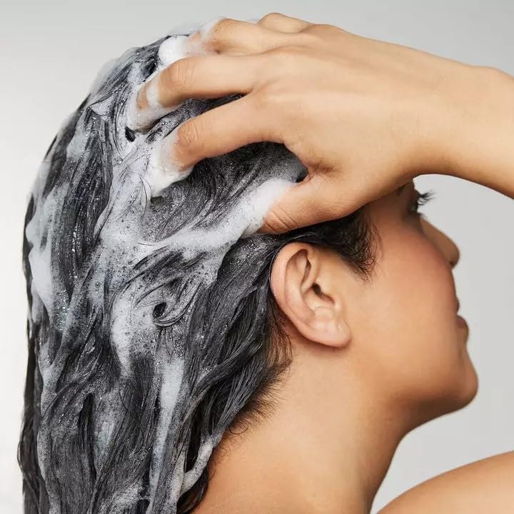 Awapuhi Wild Ginger Nourishing Shampoo ingredients closeup shows moisture-balancing Awapuhi extract.