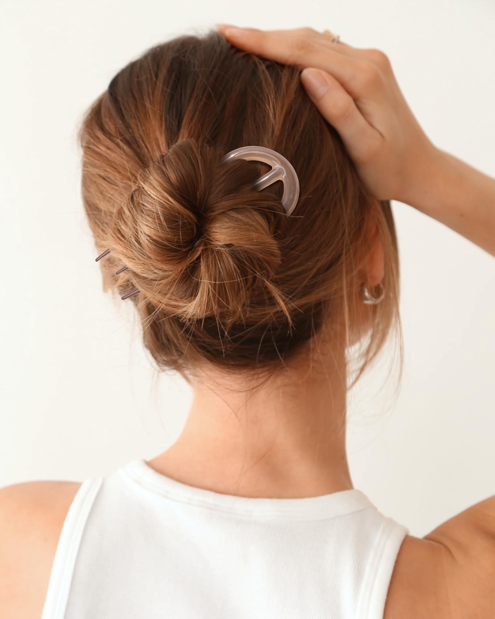 awaytr french hair pin amber chignon demonstrates elegant updo styling for weddings and events