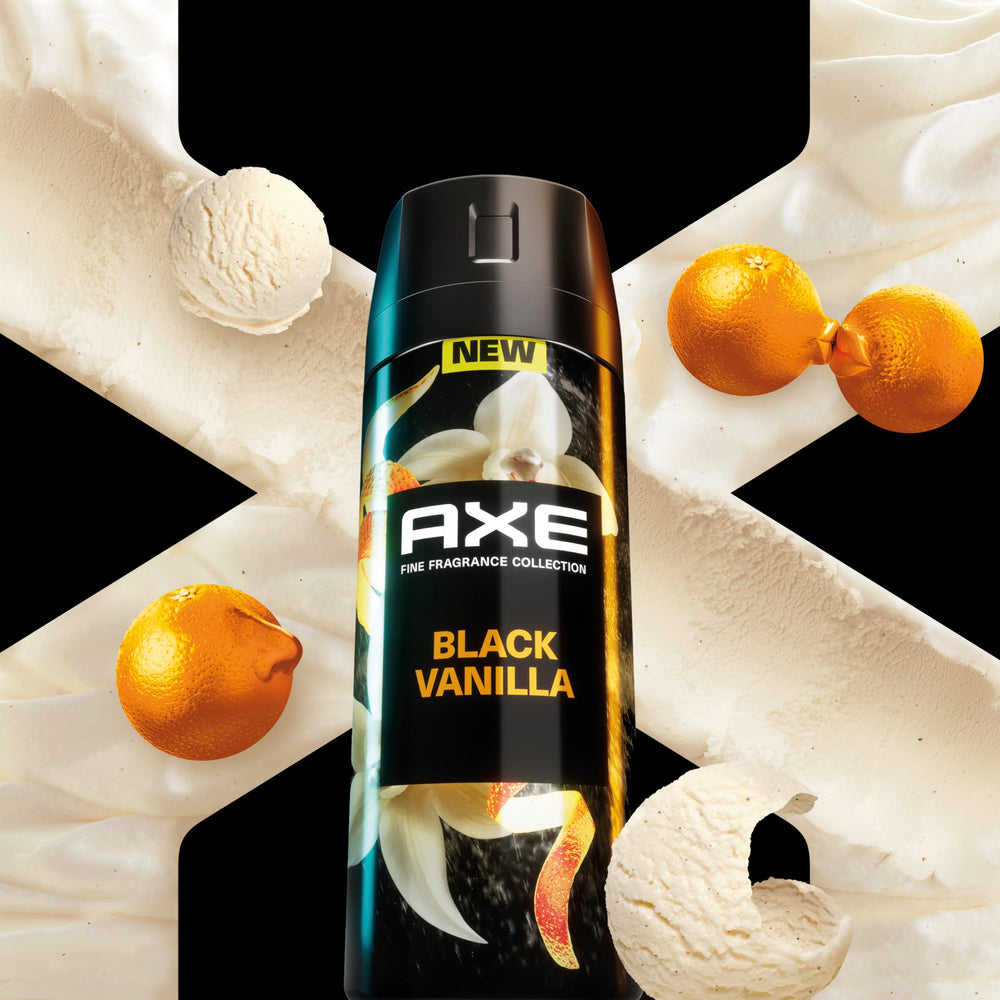 AXE Fine Fragrance Spray in use to neck and chest for refreshment.
