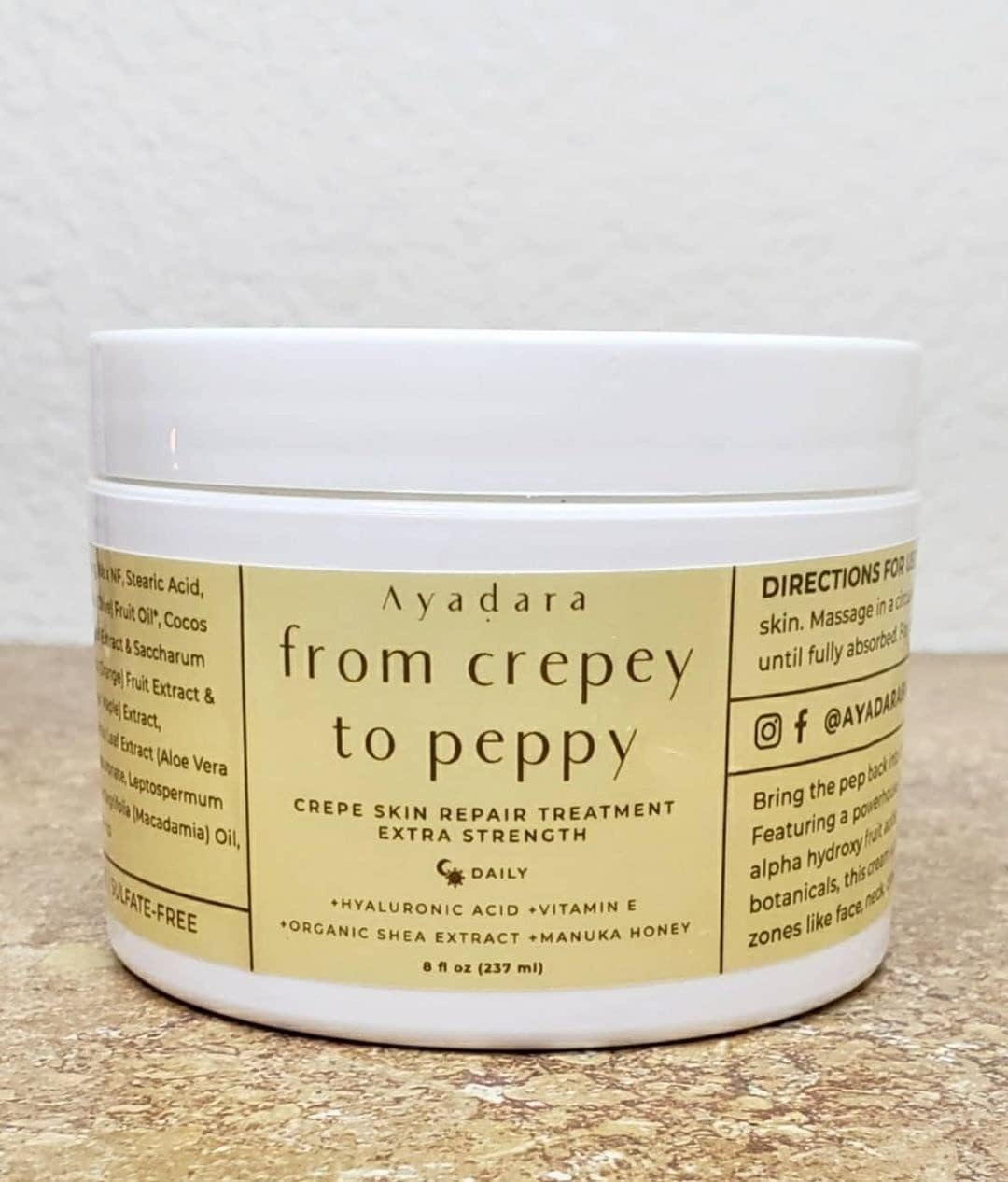 AYADARA Crepey Skin Repair Cream application on arm shows tightening and smoothing.