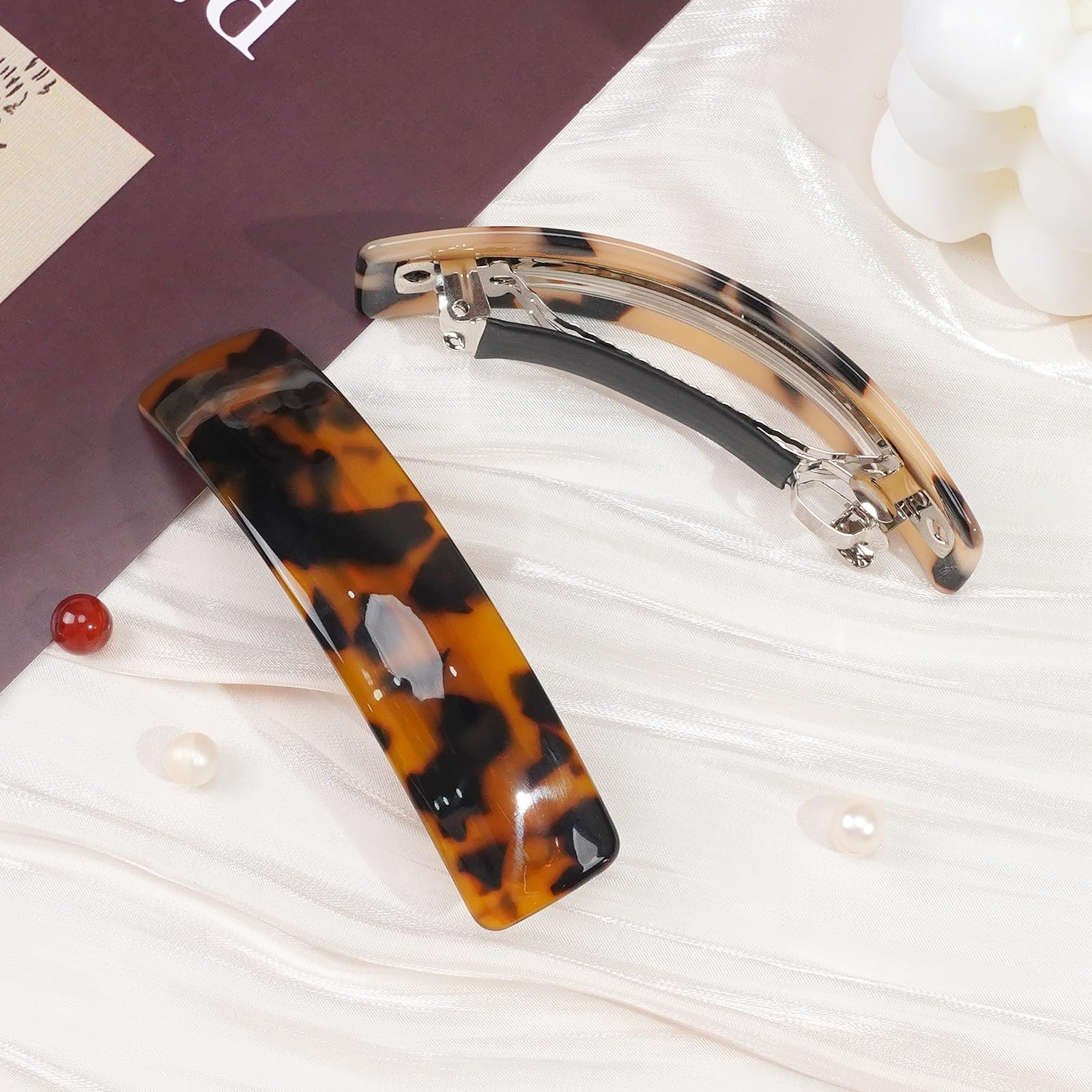 Ayesha sleek ponytail clip in gold provides secure grip for day-long wear.