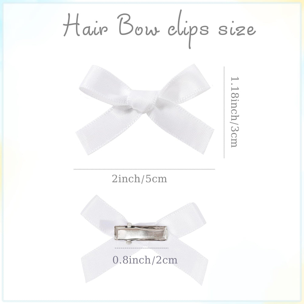 Ayesha white mini bows on elastic pony shows easy styling.
