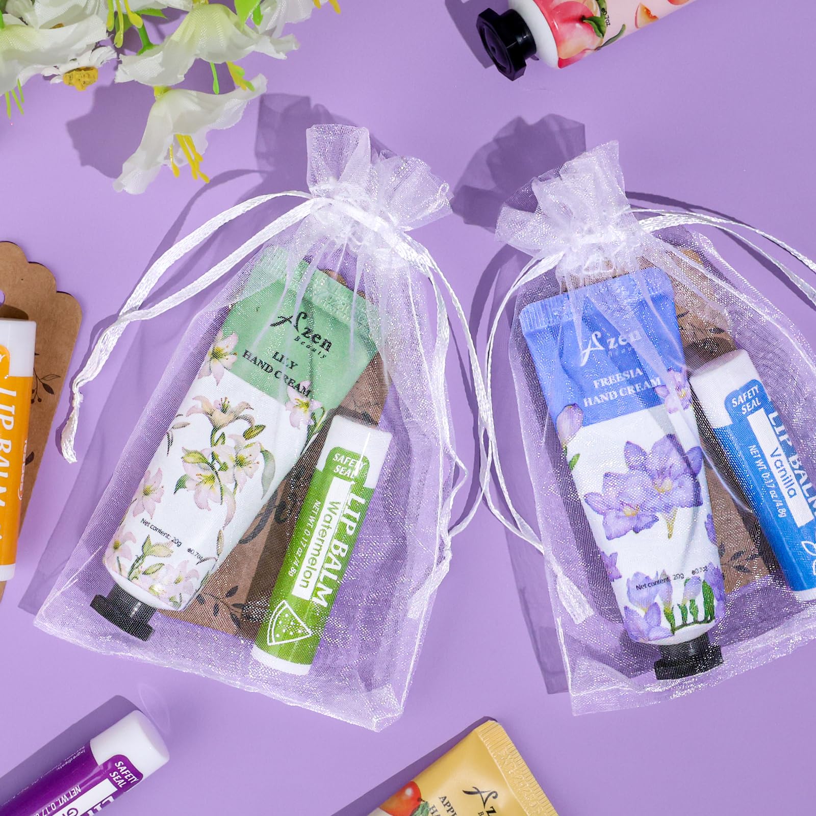 AZEN white organza bags provide elegant packaging for wedding or event favors.