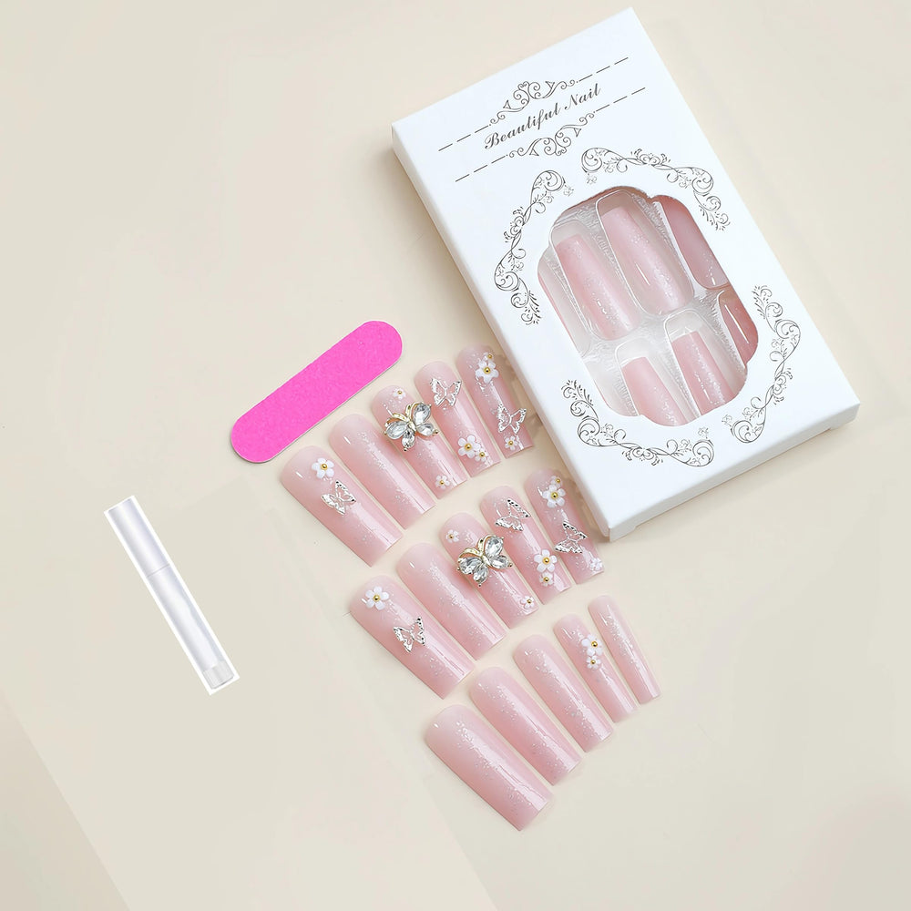 BABALAL acrylic squoval glitter nails create a chic salon-inspired look.