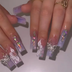 BABALAL purple press-on nails showcase long square butterfly design for elegant evening looks.
