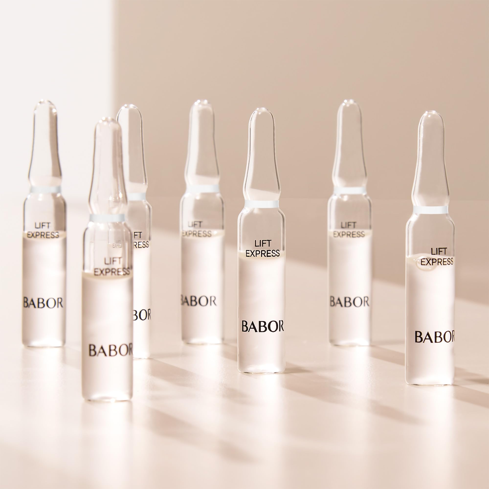 BABOR Lift Express Ampoule Concentrate ingredients highlight Vitamin A and E for skin texture.