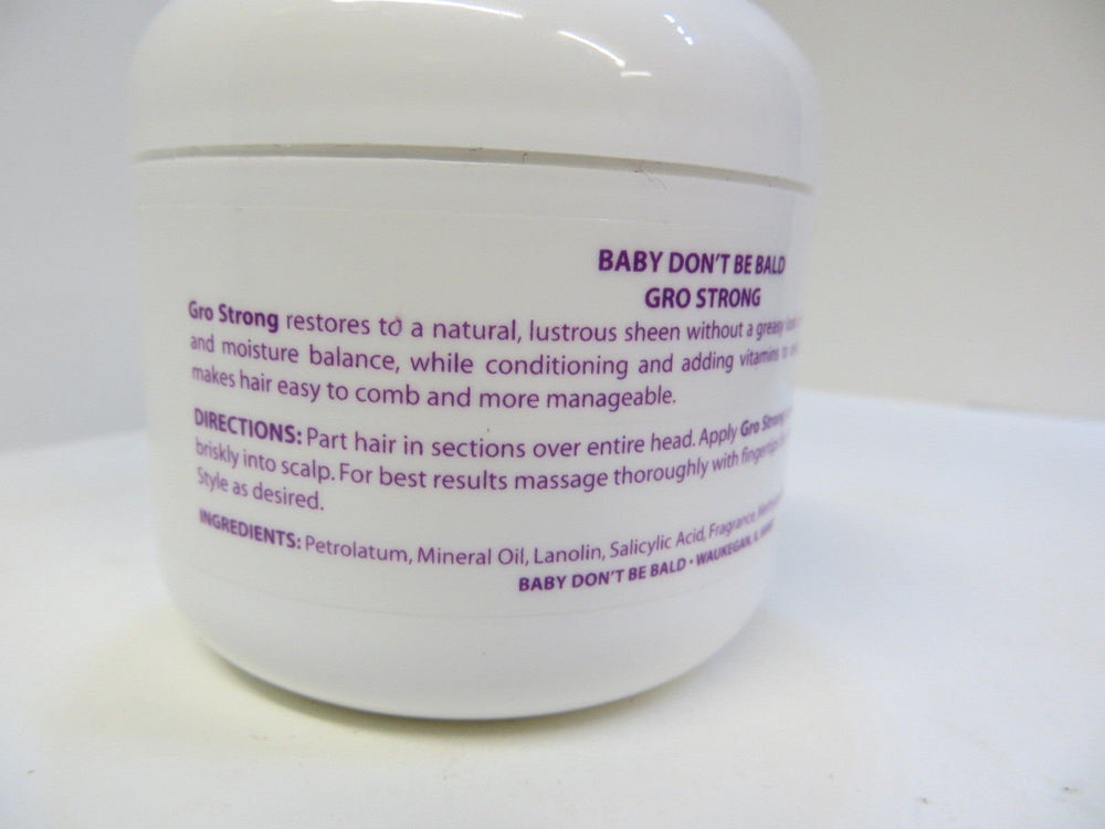 Close-up of Baby Don't Bald Gro Strong dropper for controlled application.