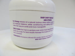 Close-up of Baby Don't Bald Gro Strong dropper for controlled application.