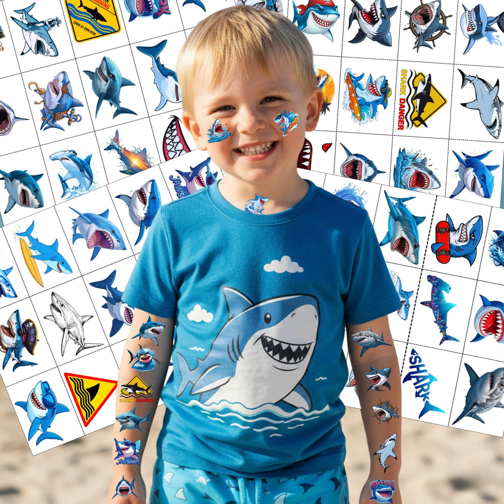 Backtopeia Shark tattoos used as party favors at a celebratory table.