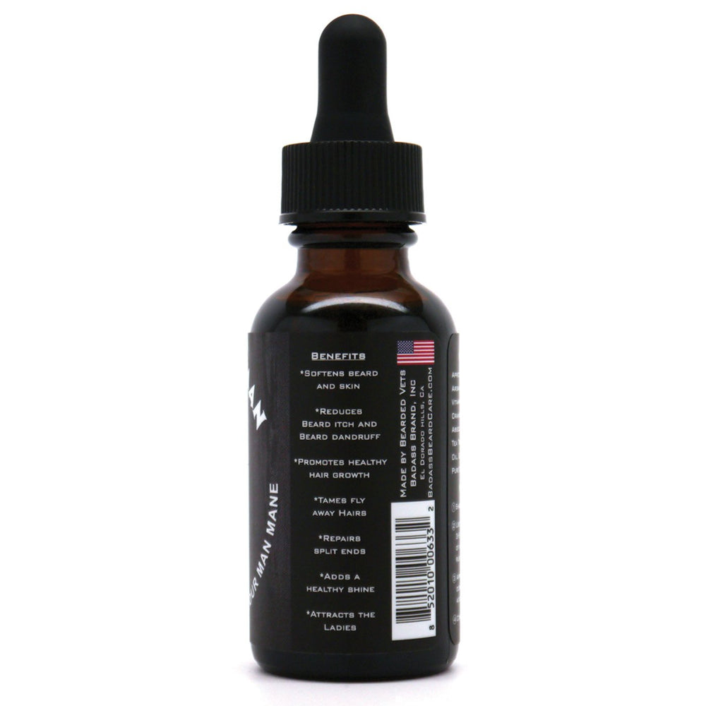 Badass Beard Care Oil dropper closeup shows grooming for softer, healthier-looking beard.