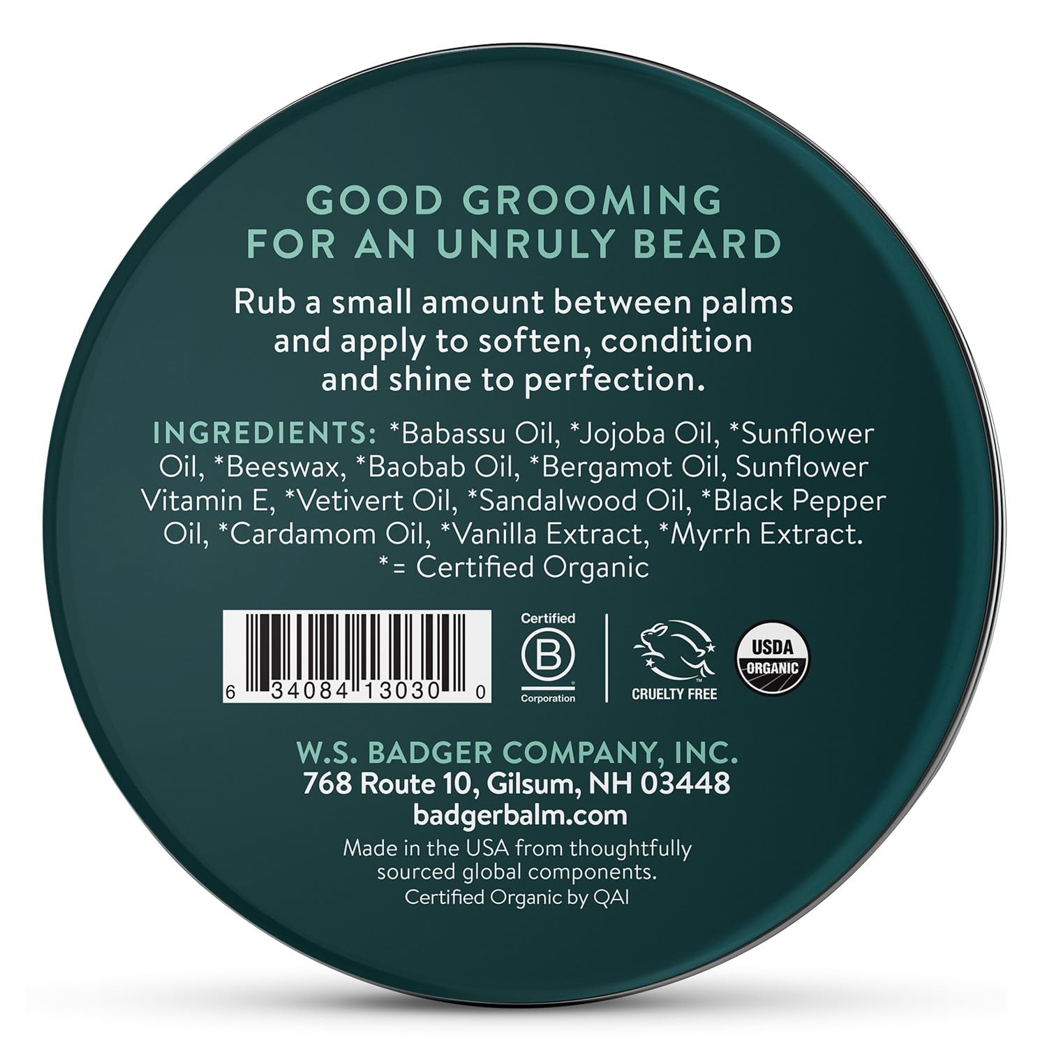Badger beard balm in hands illustrating easy, non-greasy styling and tame