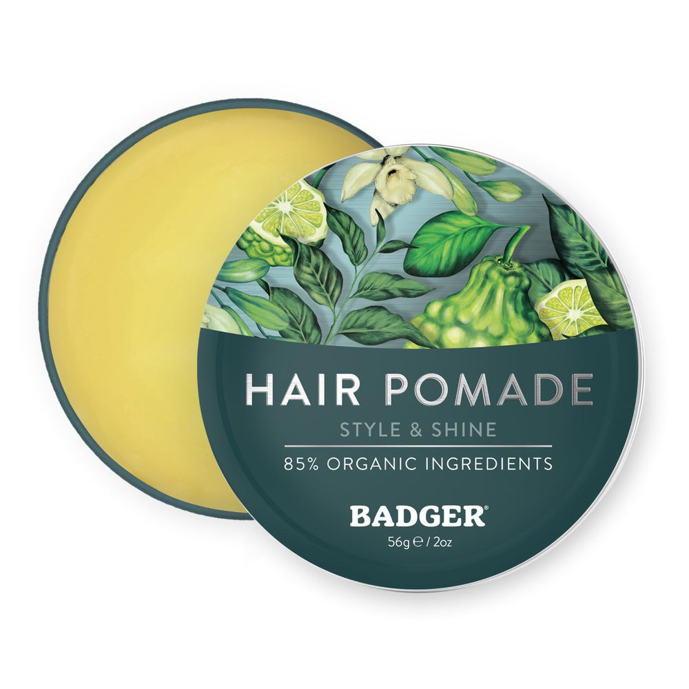 Badger Hair Pomade tin closeup highlighting organic formula for versatile daily styling.