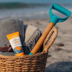Badger Kids Mineral Sunscreen reef-safe sunscreen at poolside with 80-minute water resistance.