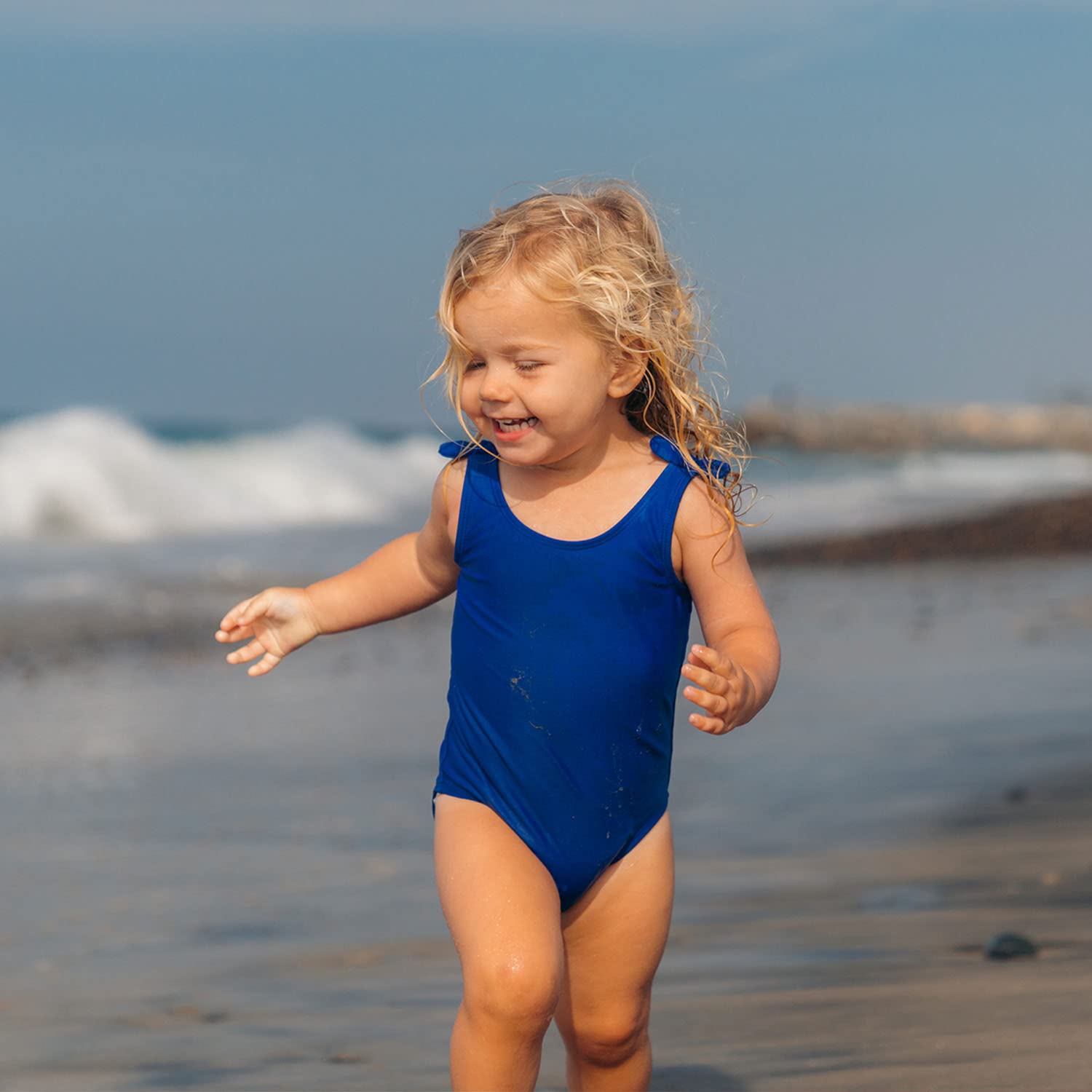 Badger Kids Mineral Sunscreen Hawaii-approved label photographed with tropical setting.
