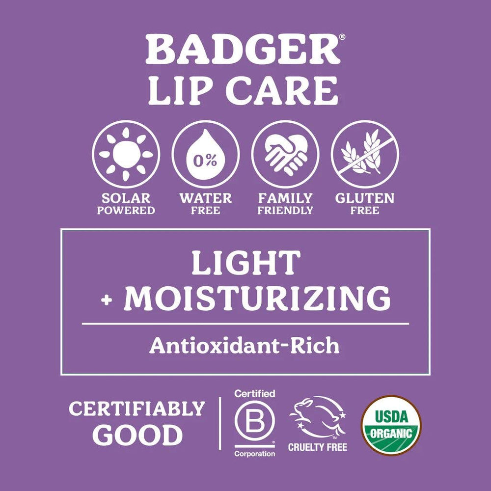 Badger Tangerine Breeze lip balm tube evokes bright flavor with silky finish.