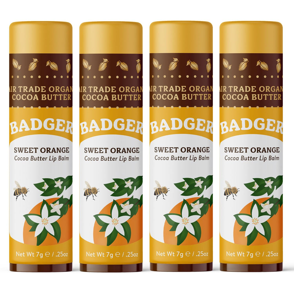 Badger Sweet Orange Cocoa Butter Lip Balm 4-pack sticks deliver long-lasting moisture.