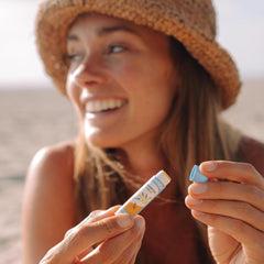 Badger lip balm with olive oil and beeswax nourishes sensitive lips.