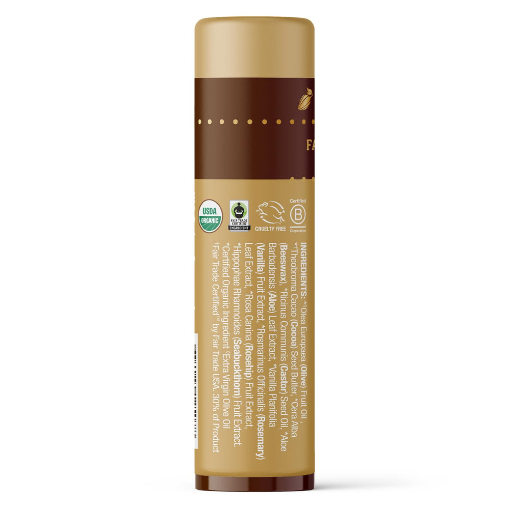 Badger lip balm texture close-up showing creamy cocoa butter and vanilla scent for daily moisture