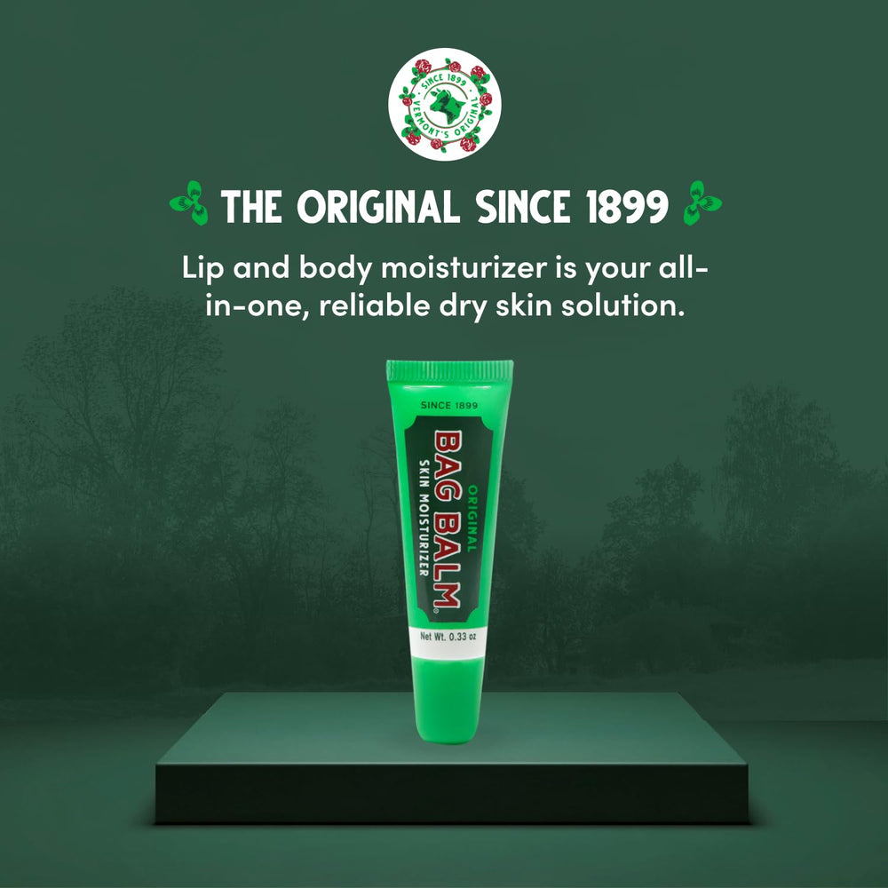 Bag Balm Original lip balm tube being applied to lips for moisture.