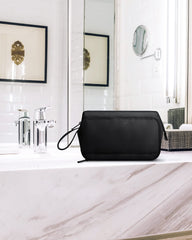 BagSmart Toiletry Bag wide opening design in action for easy item access.