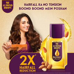 Bajaj Almond Drops ingredients close up highlights almond oil for conditioning