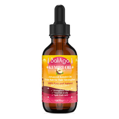 Bali Aga Kemiri Oil bottle pour shows nourishing hair support.