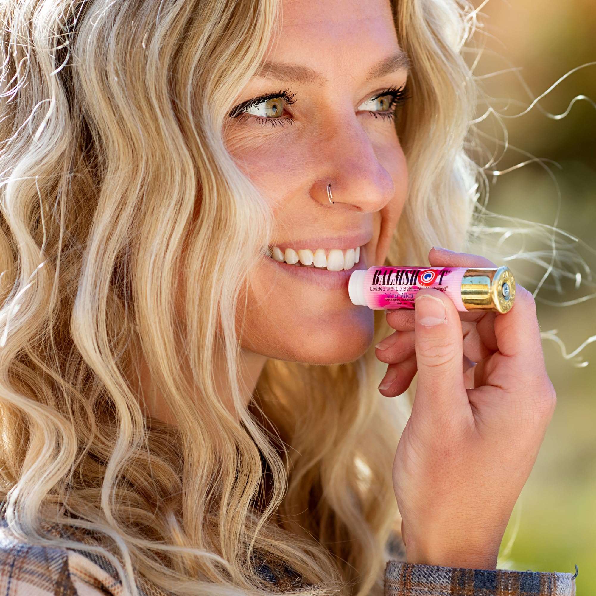 Balmshot lip balm with SPF 15 protects lips during sunny outdoor activities.