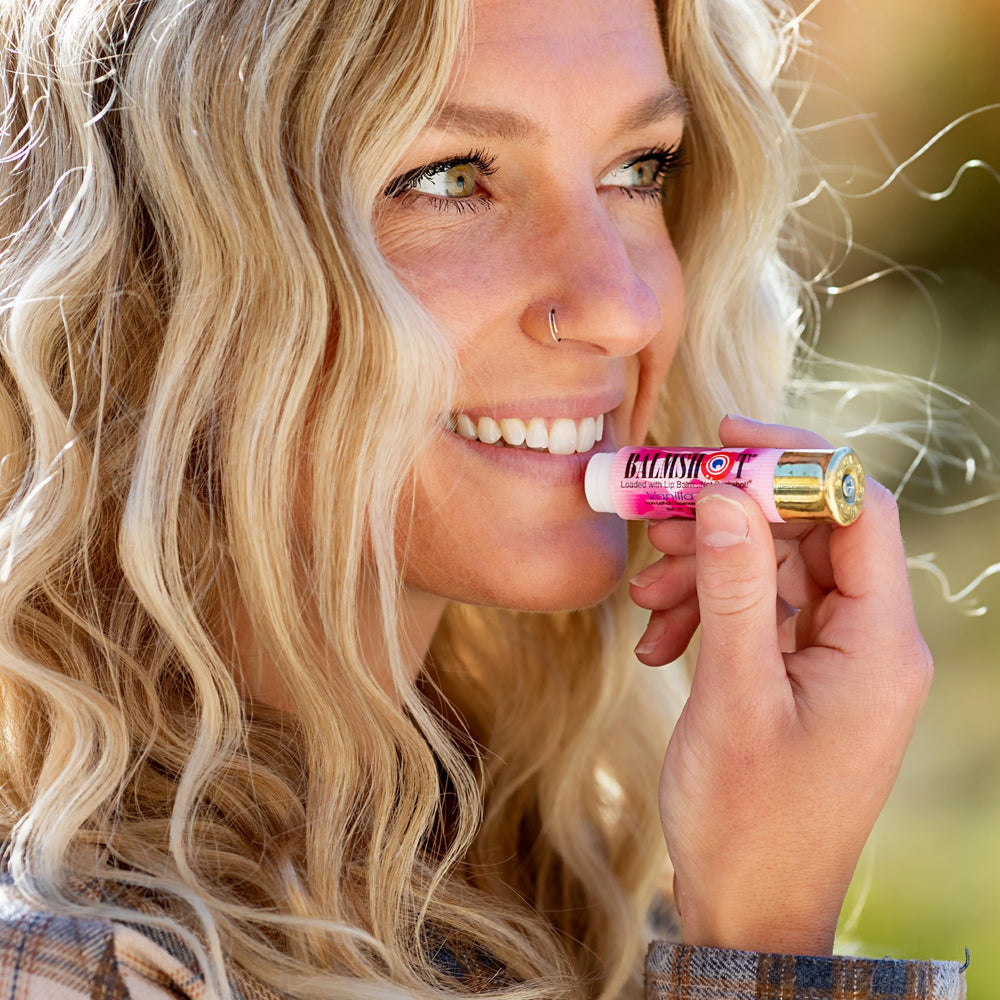 Balmshot lip balm with SPF 15 protects lips during sunny outdoor activities.