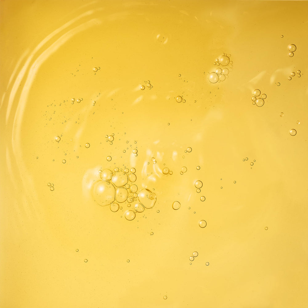 Bambu Earth toner application on cheek demonstrates easy daily use.