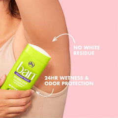 Ban Invisible Solid Shower Fresh application close-up shows smooth, clear glide on skin.