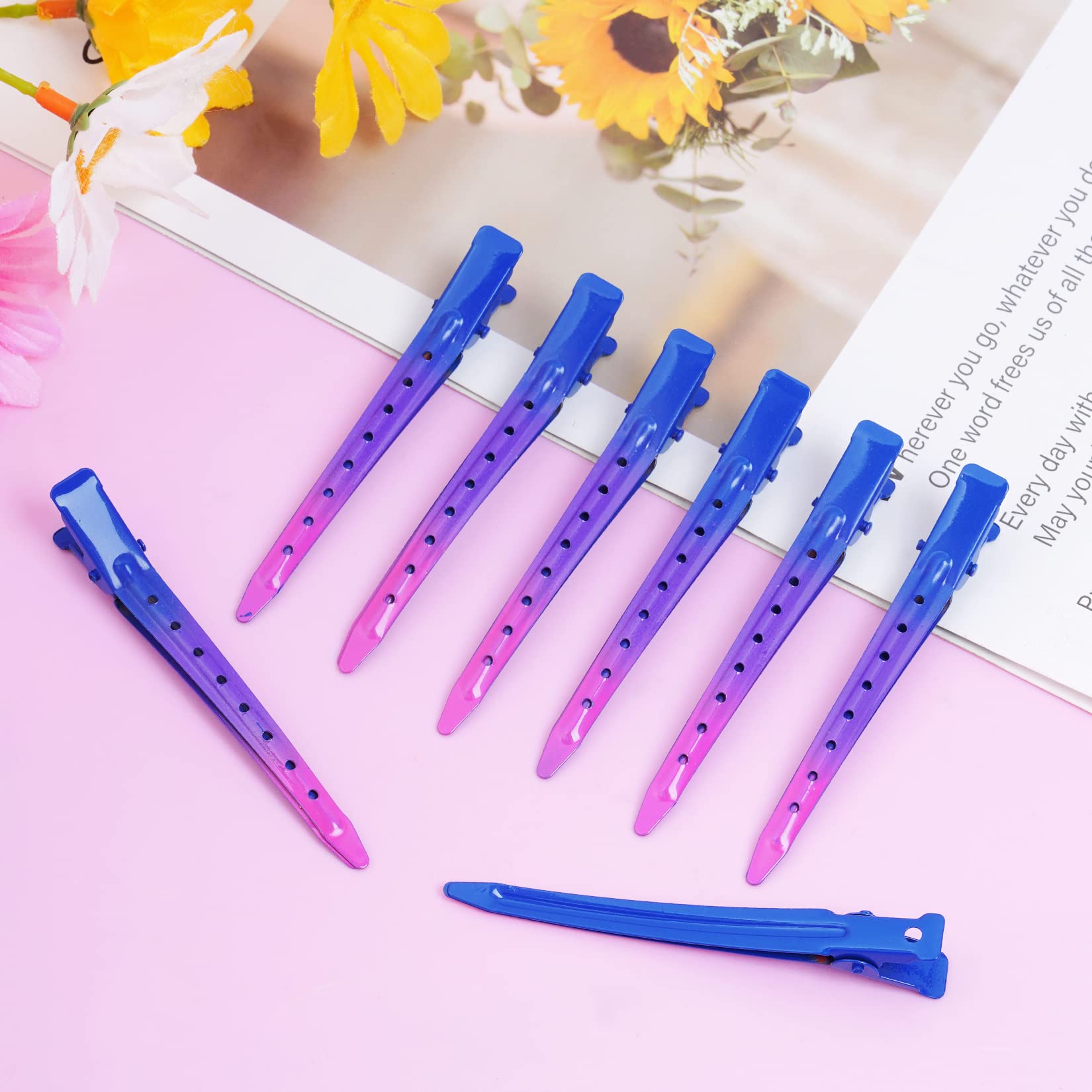 Bantoye clip with holes for secure grip during hair sectioning