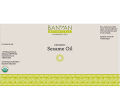 Banyan Botanicals sesame oil amber glass jar highlights pure unrefined quality.