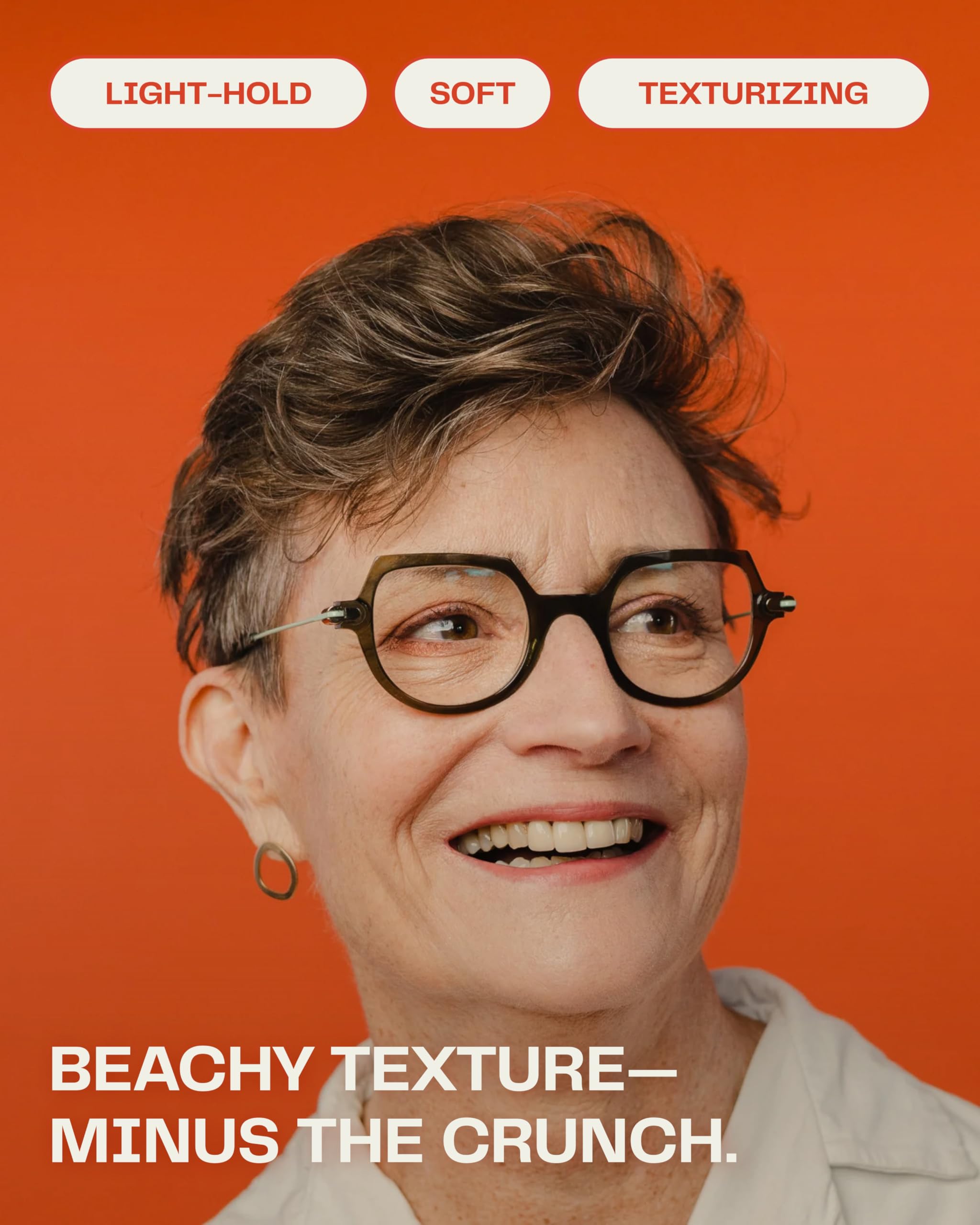 Barb Sea Salt Spray textured-hair look on model emphasizes flexible hold.