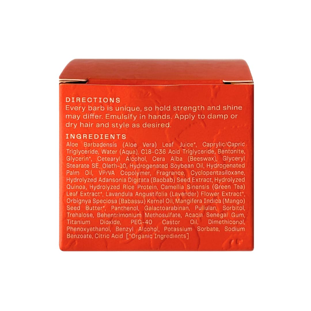Barb Soft Clay Pomade bottle in use shows versatile styling options.