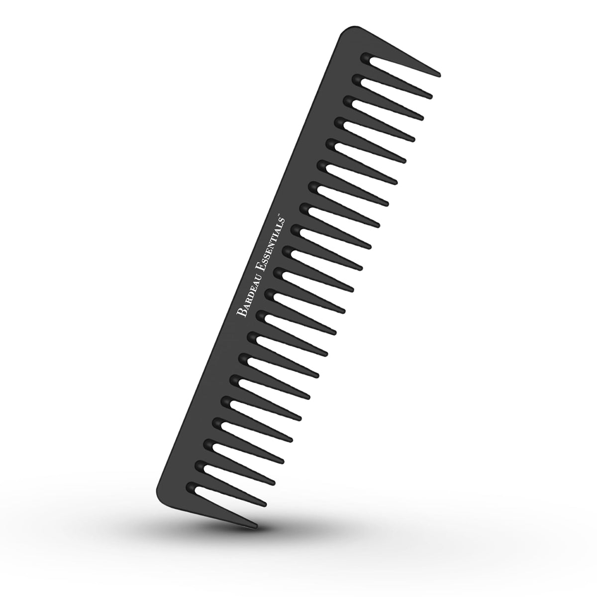 Bardeau Essentials black carbon wide-tooth comb in hand for gentle detangling and styling.