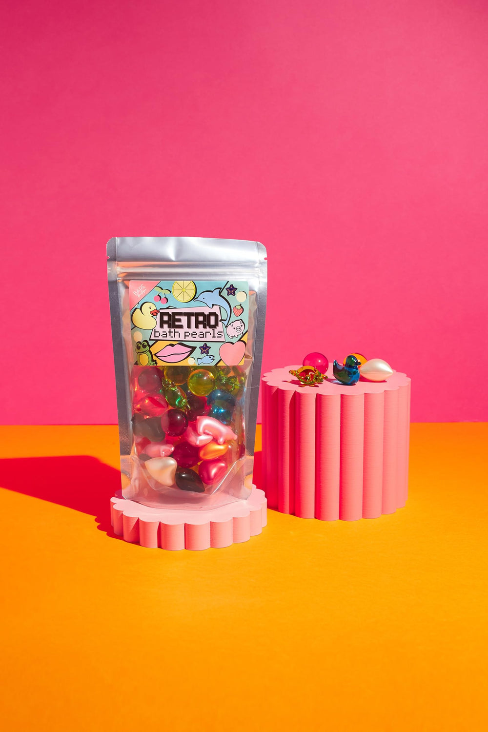 Bare Boutique retro bath beads in water releasing oils for a moisturizing experience