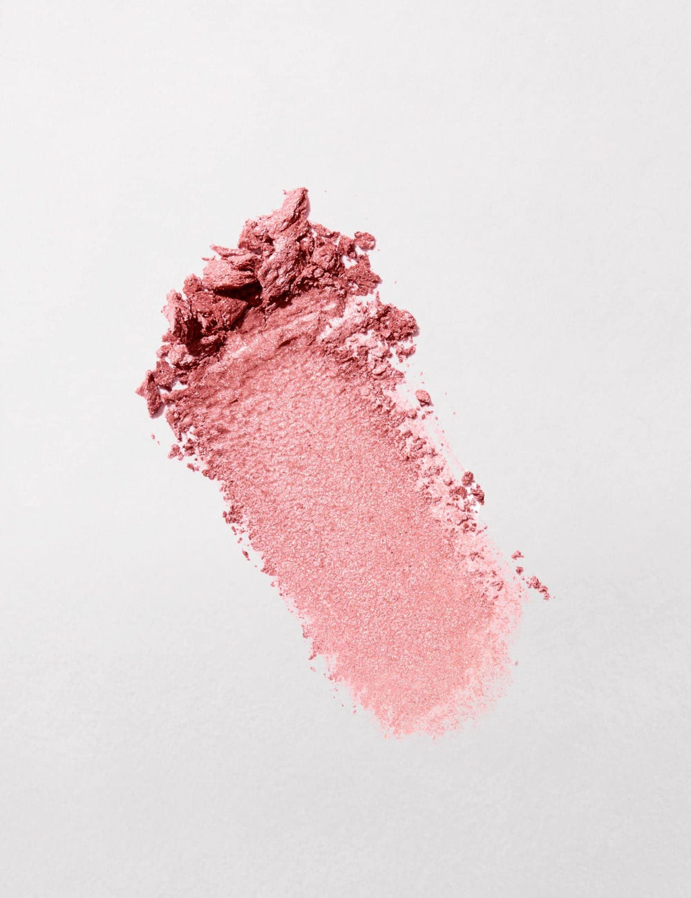 bareMinerals Gen Nude Blonzer rosy-bronze swatch demonstrates buildable color for customizable glow.