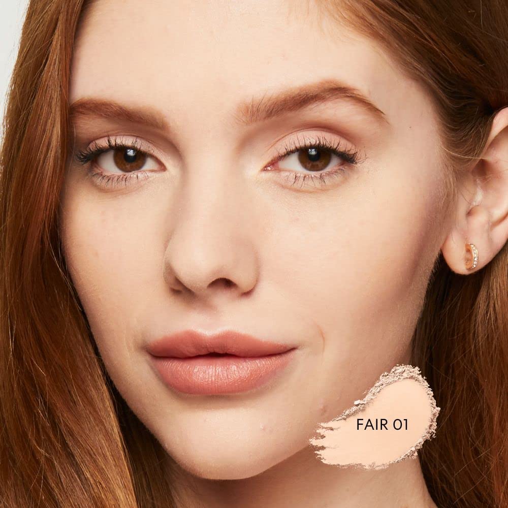 bareMinerals foundation being applied with brush for buildable coverage