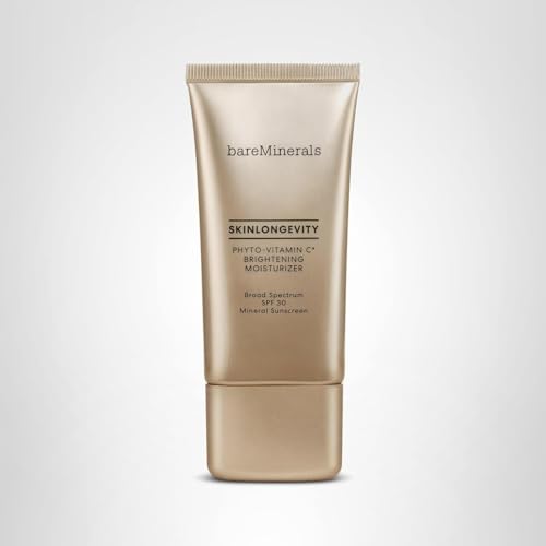 bareMinerals Skinlongevity Phyto-Vitamin C bottle on countertop ready for daily use.