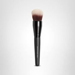 BareMinerals Smoothing Face Brush in use for even coverage with complexion Rescue gel.