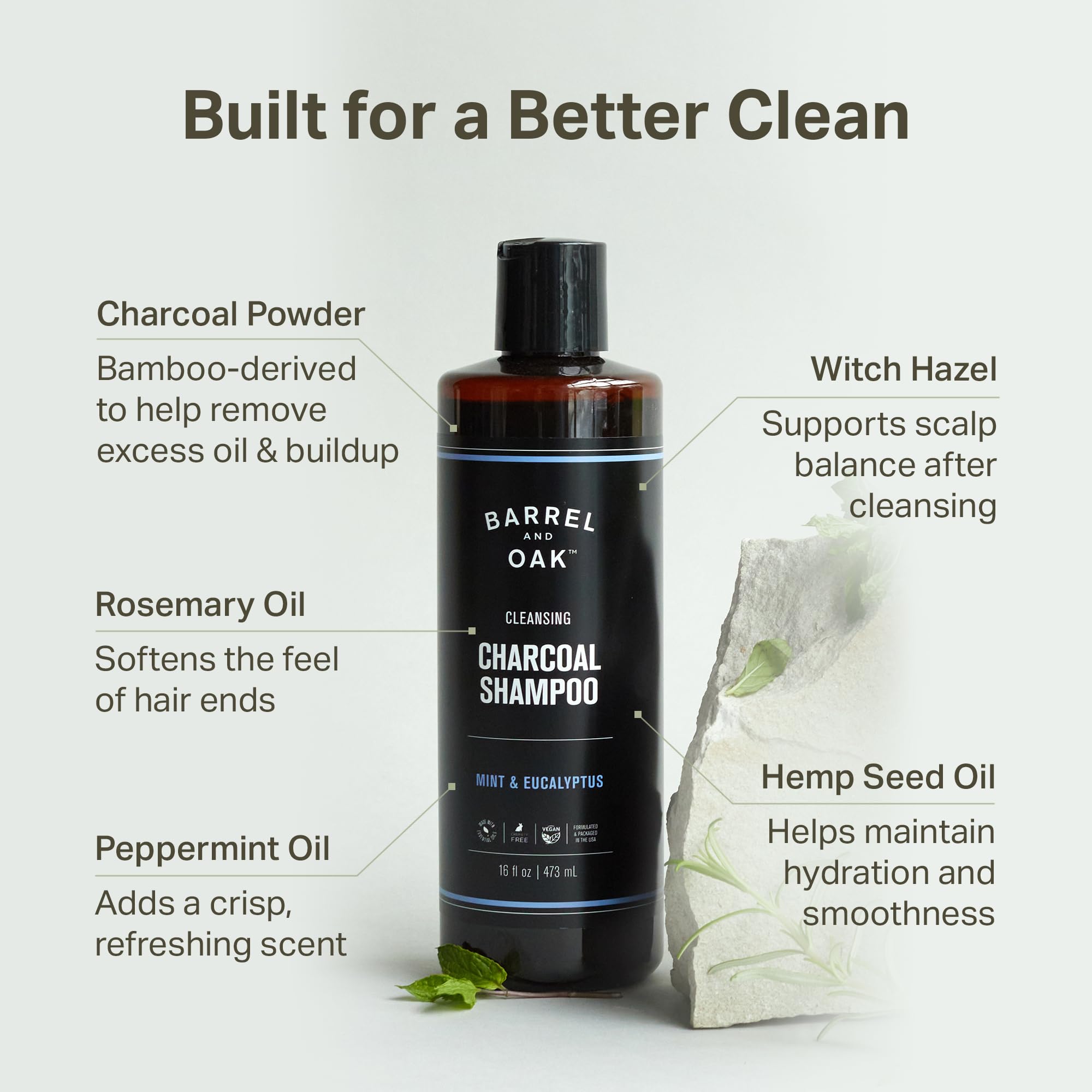 Barrel & Oak mint eucalyptus charcoal shampoo closeup bottle shows bold vegan formula ready for use.