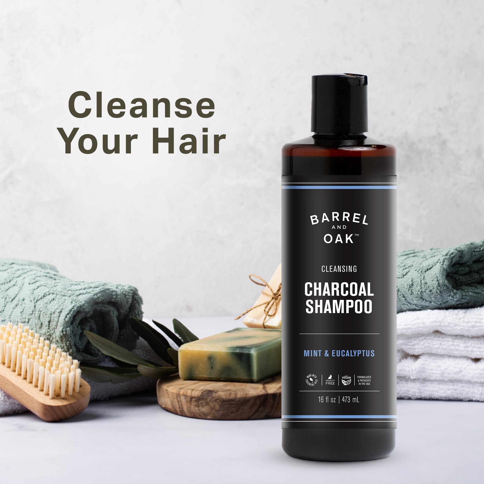 Barrel & Oak mint eucalyptus charcoal shampoo foam dispense highlights quick lather for a clean wash.