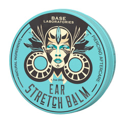 BASE LABORATORIES Ear Stretching Balm closeup showing creamy texture for easy gauge insertion.