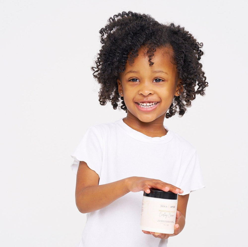 BASK & LATHER curling cream with amaranth extract highlights nourishing moisture and defined curls.