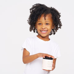 BASK & LATHER curling cream with amaranth extract highlights nourishing moisture and defined curls.
