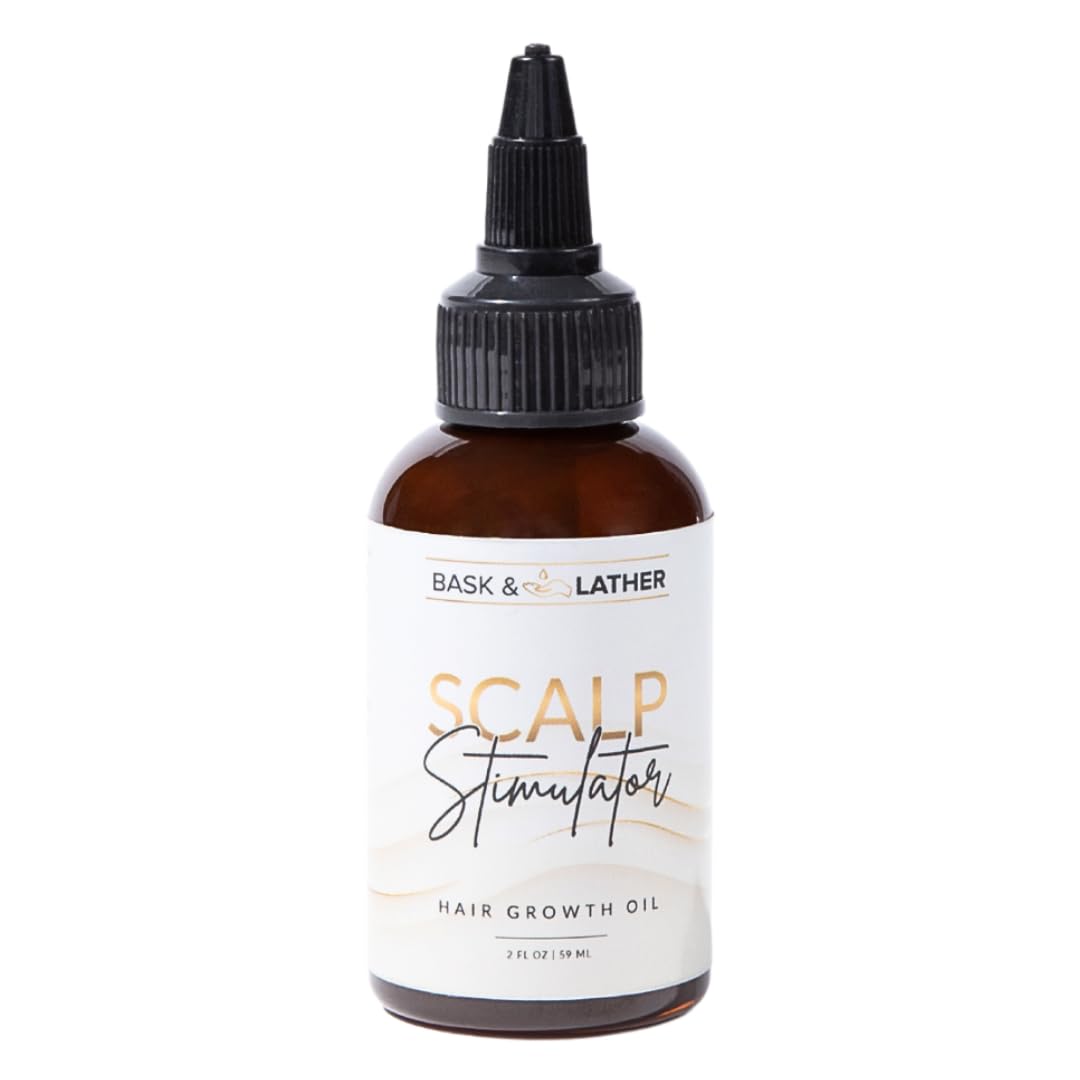 Bask and Lather scalp stimulator bottle closeup with mint rosemary blend for healthy scalp.