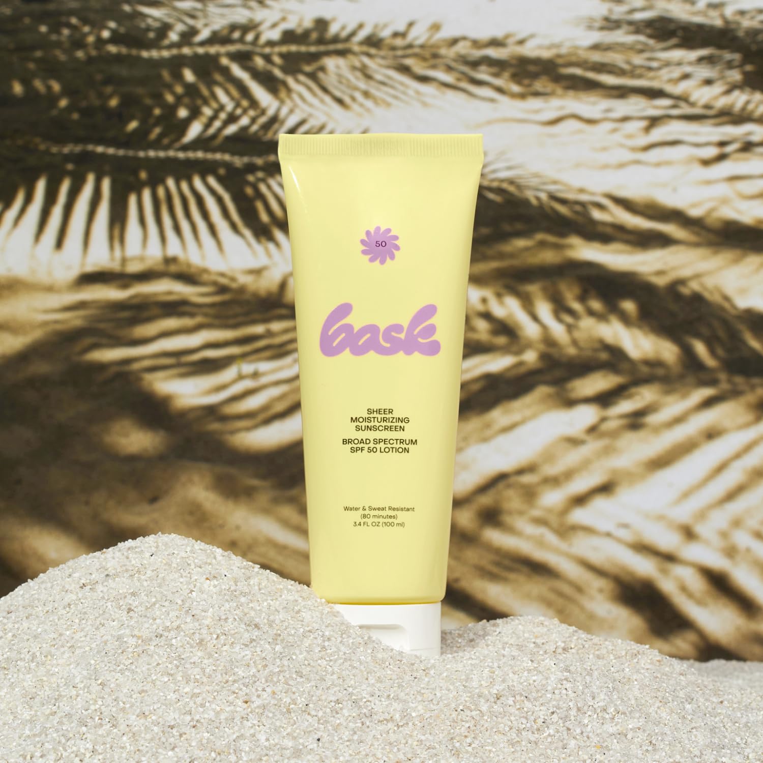 Bask Suncare SPF 50 bottle close-up showing lightweight, non-greasy texture.